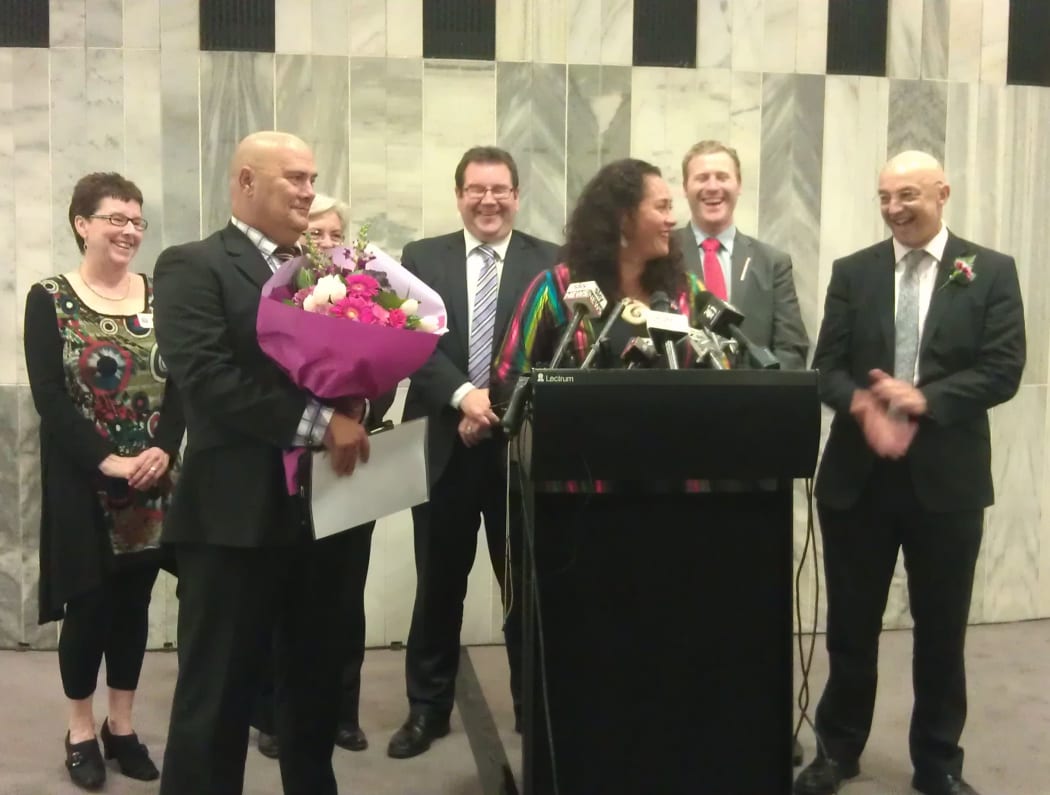 Labour's Louisa Wall (at podium) with supporting MPs after the vote on Wednesday.