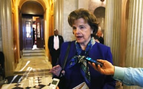 Dianne Feinstein speaking to reporters.
