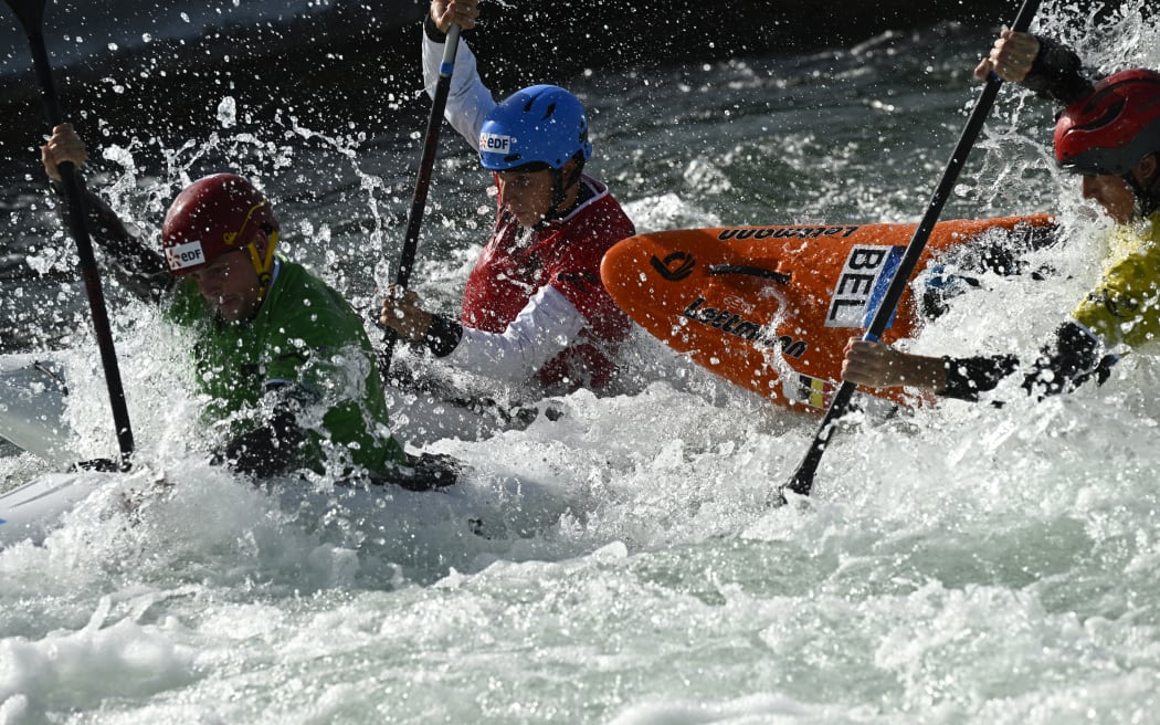 Paddlers competing in kayak cross.