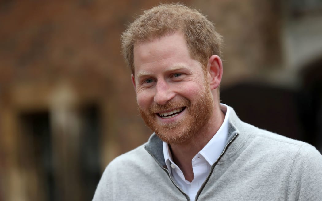 Britain's Prince Harry, Duke of Sussex, speaks to the media at Windsor Castle, following the announcement that his wife, Britain's Meghan, Duchess of Sussex has given birth to a son.