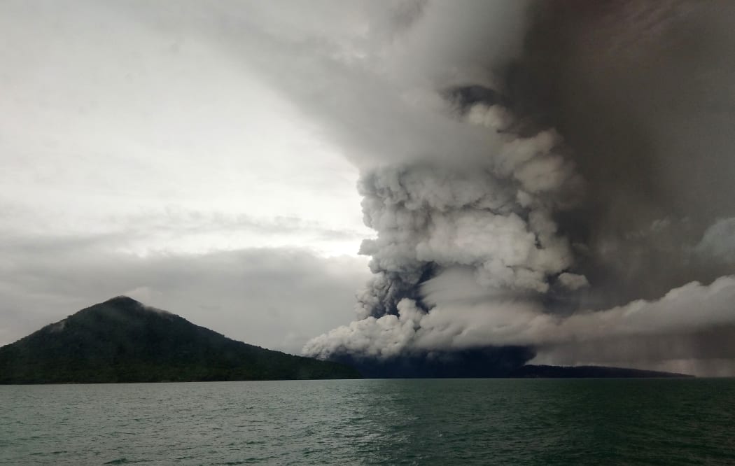 Anak (Child) Krakatoa volcano erupting, as seen from a ship on the Sunda Straits on 26 December.