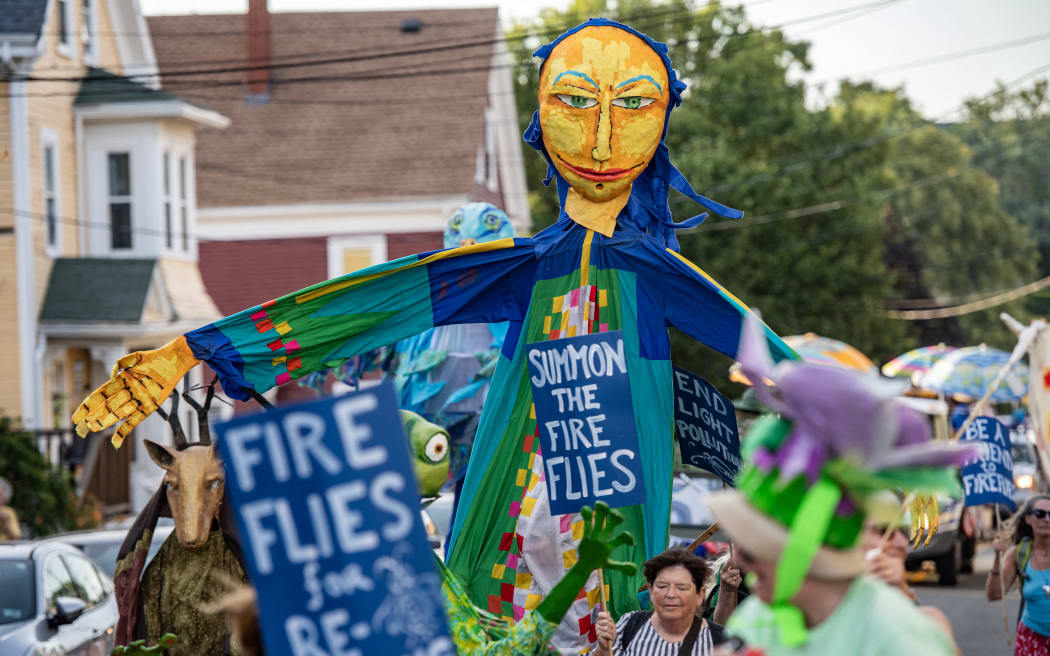 Costumed revelers march through the streets during the Fishtown Horribles Parade, ahead of Independence Day, in Gloucester, Massachusetts on July 3, 2024. The parade is part of the city’s July 4th celebrations.