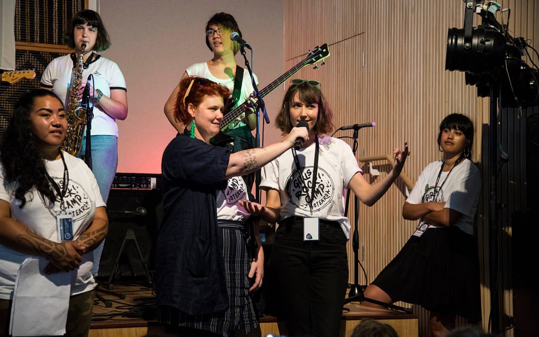 Bass tutors Kiki Van Newtown and Cass Basil on stage at the showcase.