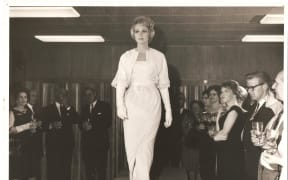 Babs Radon Wellington parade for Australian fashion buyers, 1963. PM Keith Holyoake can be seen smoking in the background.