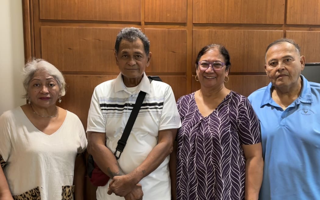 Pacific Association for Radiation Survivors (PARS) members at a gathering. Founder/Atomic Veteran Robert Celestial(holding book)