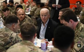 US President Joe Biden in Poland on Friday, talking with members of the US Army's 82nd Airborne Division, who are working alongside Polish allies on the Alliance's eastern flank, in the city of Rzeszow.