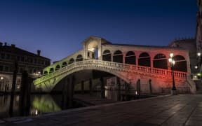 the Rialto bridge, as well as the Venice City Hall, was illuminated with the colors of the Italian flag as a sign of support for all the population affected by Covid19.