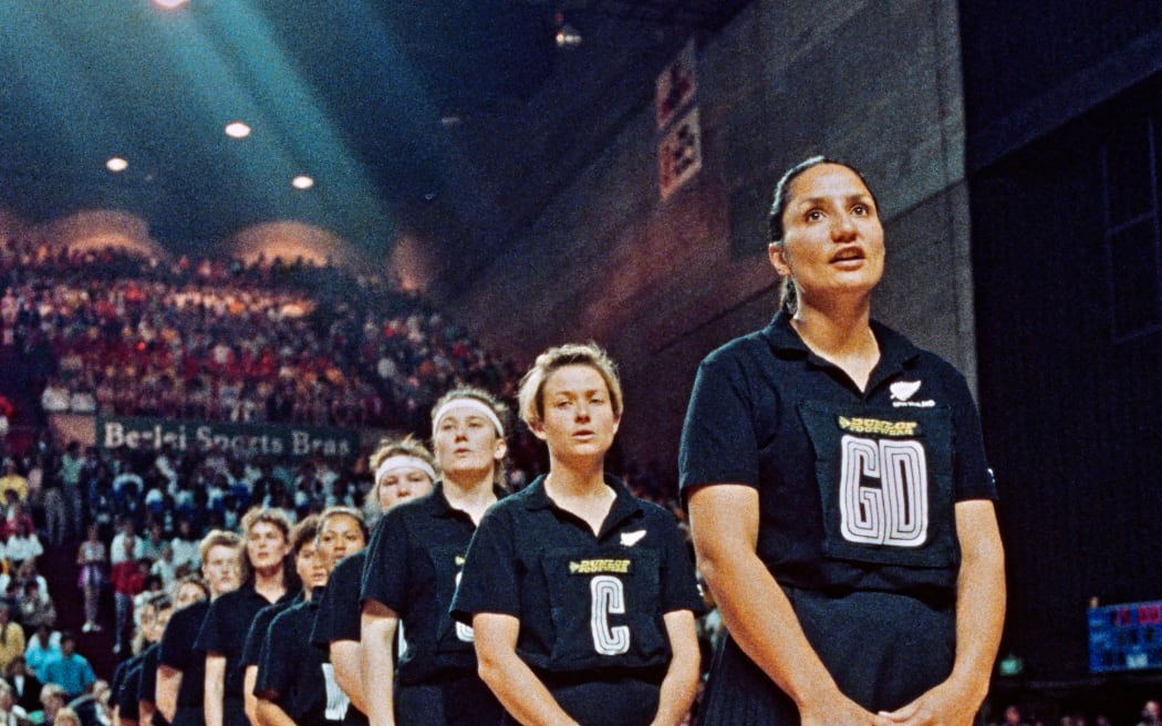 Captain Waimarama Taumaunu and Sandra Edge and team mates line up for the national athems. New Zealand Silver Ferns v Australia, 1991 Netball World Cup Final, Sydney Entertainment Centre, Sydney, Australia. 13 July 1991. Copyright photo: Bruce Jarvis / www.photosport.nz