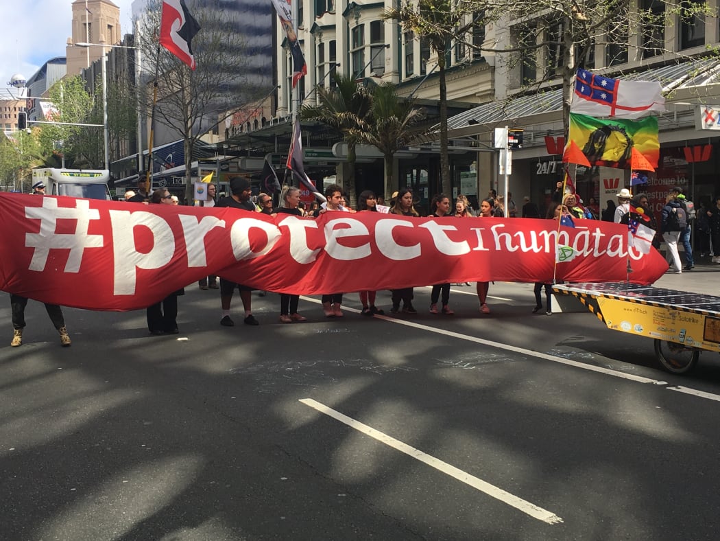 Marchers protest about ihumatao at the climate change march on Auckland's Queen St on 27 September 2019.