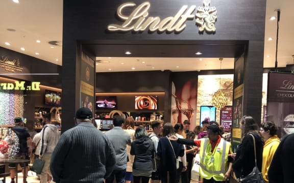 Lines of people queuing outside the Lindt store at Mānawa Bay mall