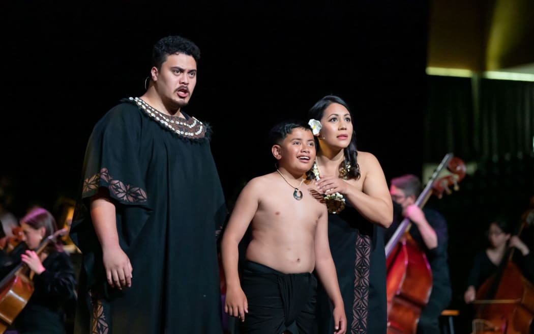 Emanuel Fonoti-Fuimaono as Tupaia, Risatisone C Malagamaali'i as Teata, and Marlena Devoe as Purea sings on stage in Ihitai ‘Avei’a - Star Navigator.