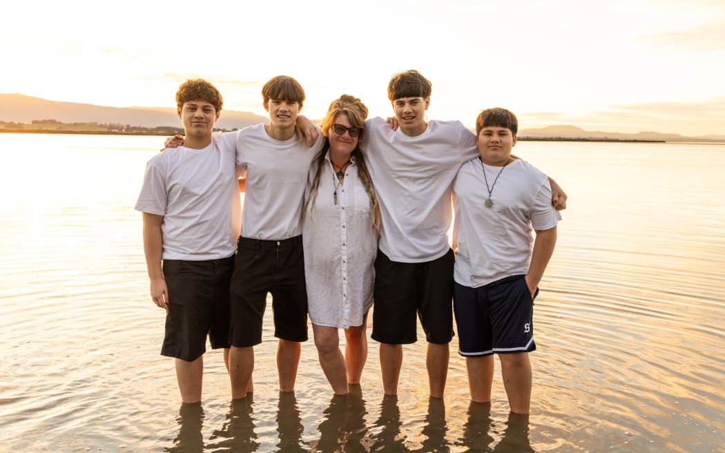 Tressa Simonsen and four of her sons: from left: Kelly, Daklan, Tressa, Darius and Kramer.