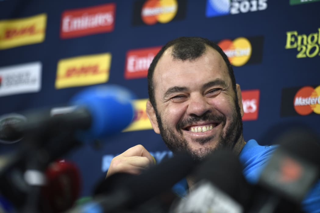 Australia's head coach Michael Cheika attends a press conference in Teddington, west London, on October 26, 2015.