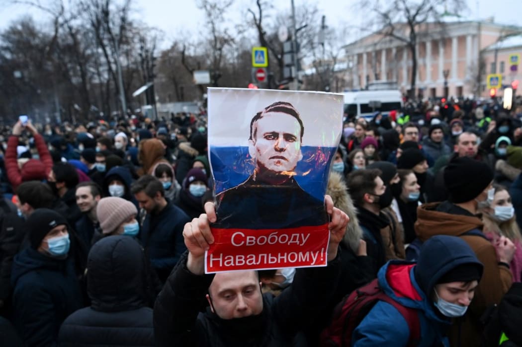 Protesters march in support of jailed opposition leader Alexei Navalny in downtown Moscow on January 23, 2021.