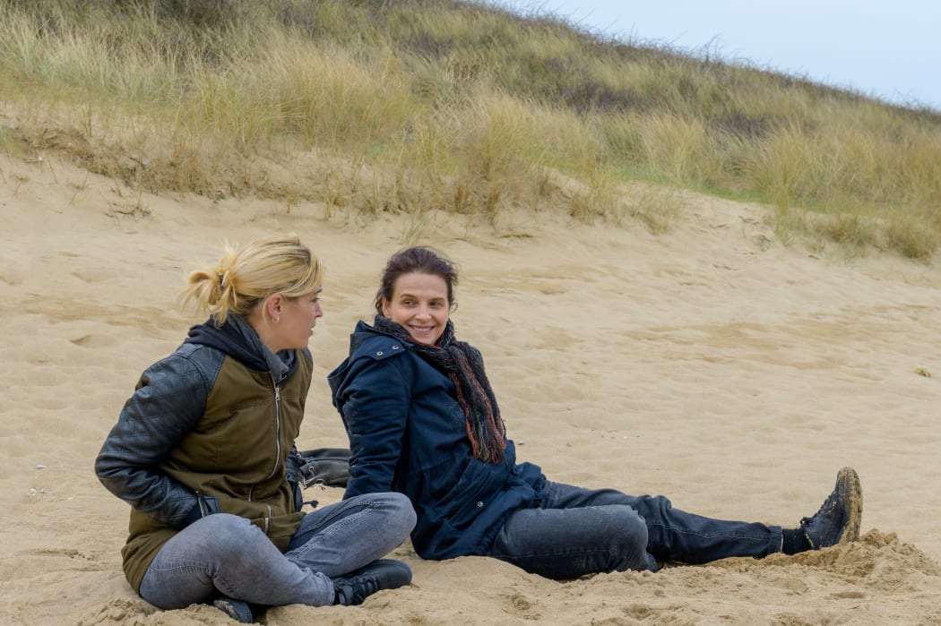 Hèléne Lambert and Juliette Binoche bond on a Normandy beach in Between Two Worlds.