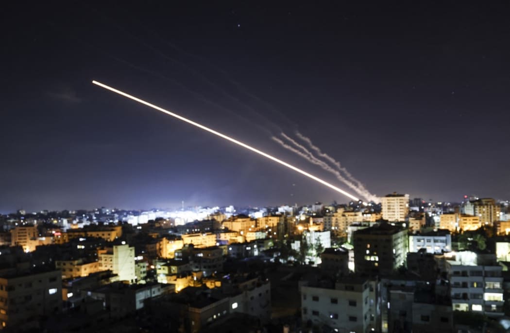 Rockets are launched from Gaza City, controlled by the Palestinian Hamas movement, towards Israel early on May 15, 2021.