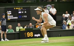 Lulu Sun celebrates her win over Emma Raducanu at Wimbledon.