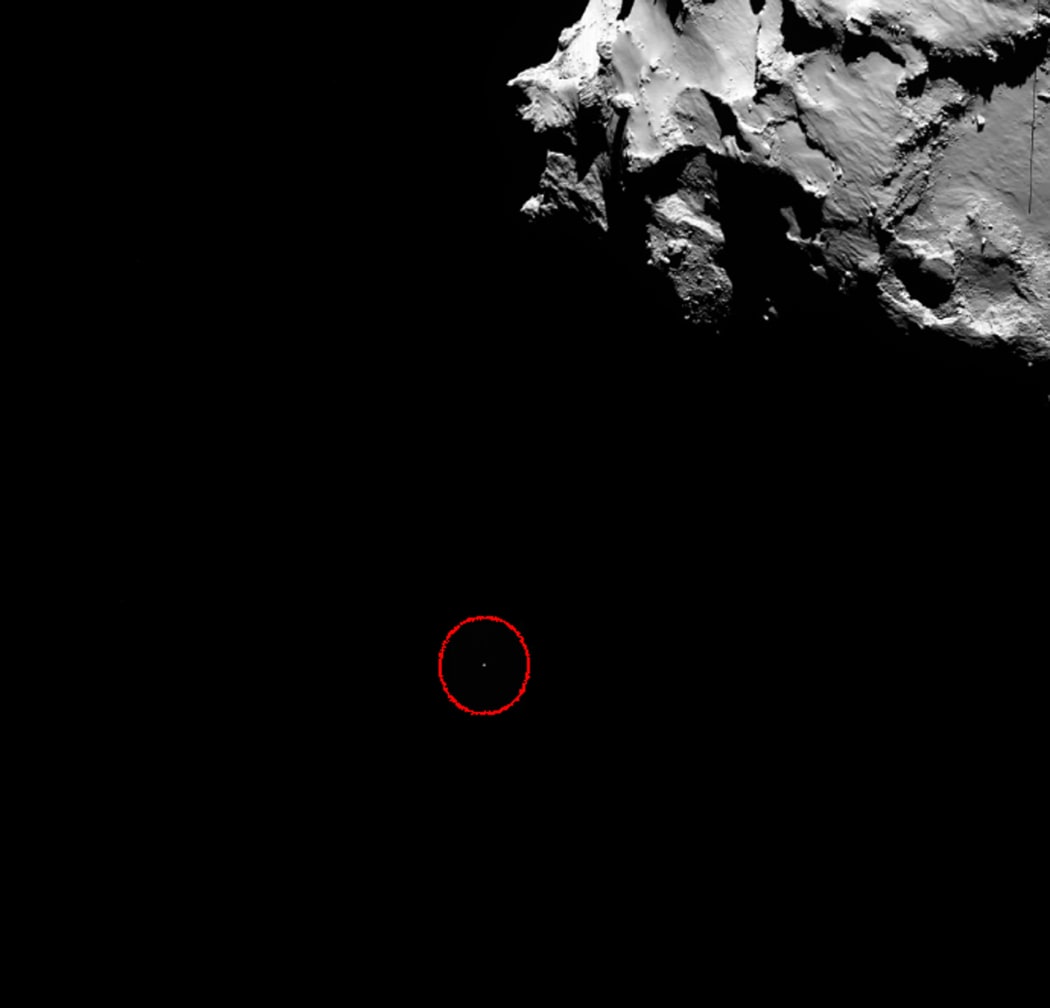 An image taken by the "mothership" Rosetta shows Philae approaching the comet.