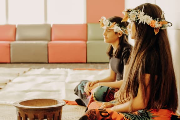 Young members from Whau Pasifika partaking in ava ceremony during a welcoming reception for the group's committee members.