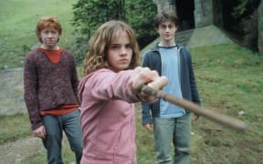 Harry Potter and the Prisoner of Azkaban (2004), directed by Alfonso Cuaron, starring Daniel Radcliffe (right), Emma Watson (centre) and Rupert Grint (left).