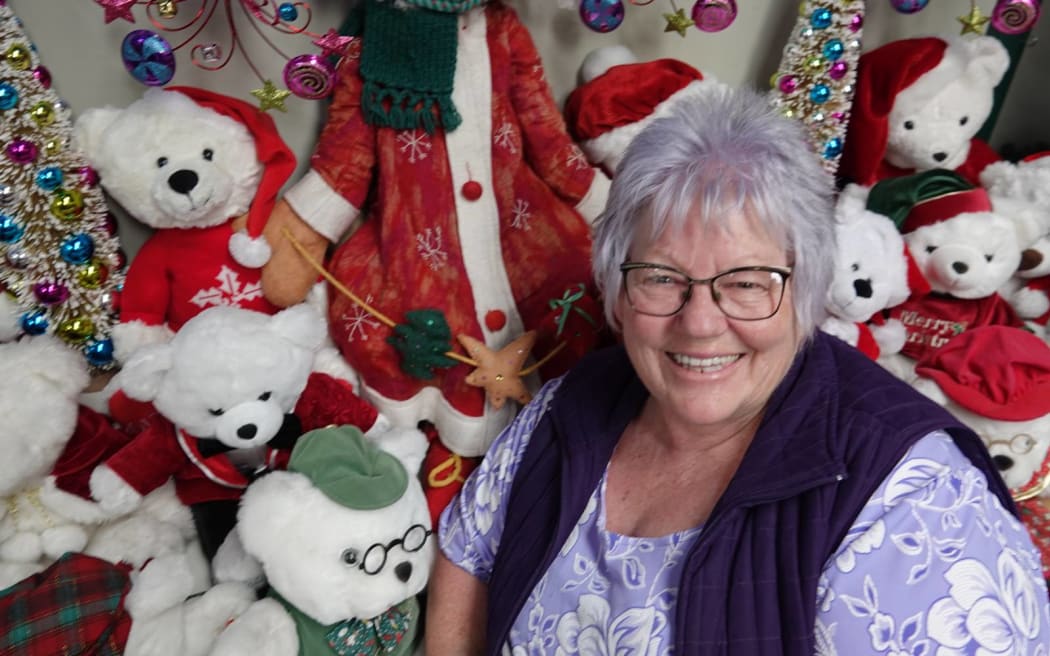 Greener sits among the children's display at her grotto.