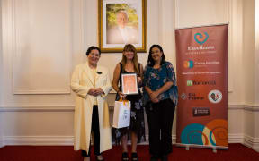 Letitia Dowie-Lewis with her award at the 14th annual Caring Families Aotearoa ceremony.