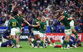 Springboks celebrate victory at full-time following the Rugby World Cup France 2023 quarter-final match against France.