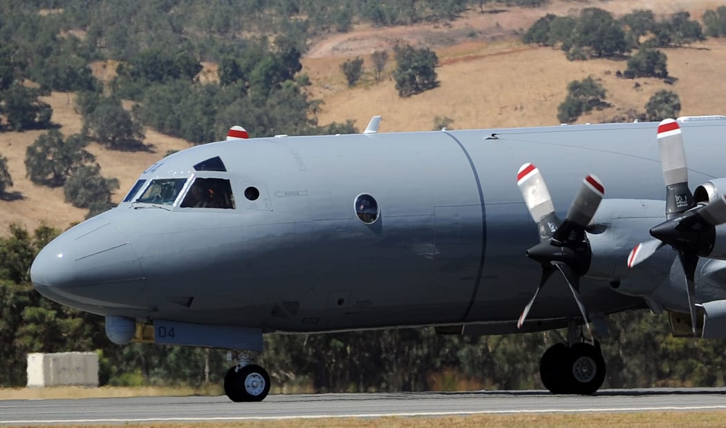 A Royal New Zealand Air Force P3 Orion aircraft on its way to take off at Pearce Airbase on Sunday to aid in the search for missing Malaysia Airlines flight MH370.