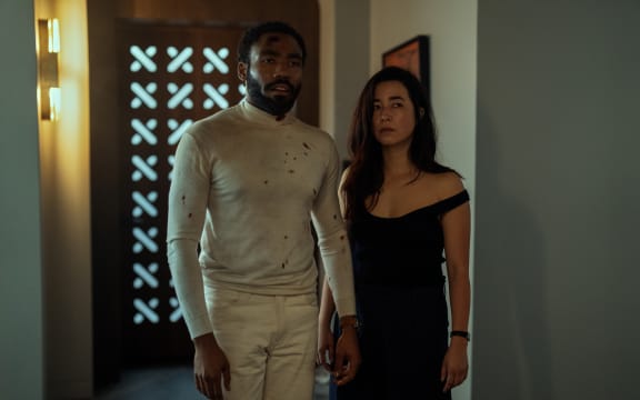 Donald Glover and Maya Erskine in scenes from Amazon Prime series Mr. & Mrs. Smith