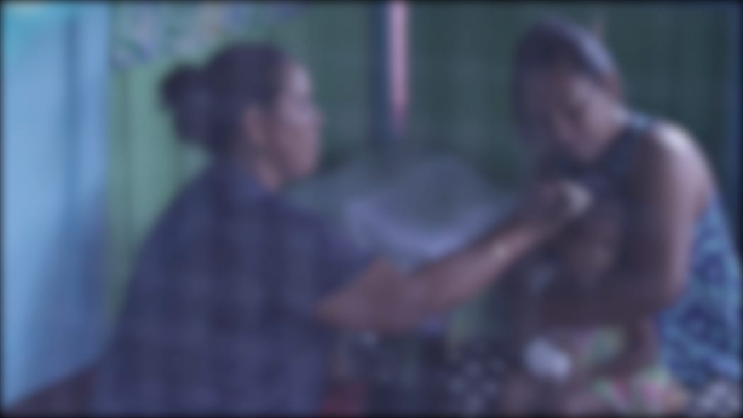 Samoan traditional healer Maria Amituanai treats patients with measles symptoms.