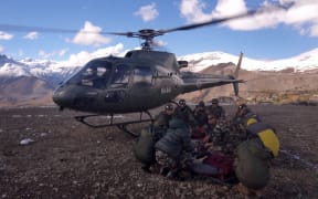 A climber is rescued in the Himalayas.