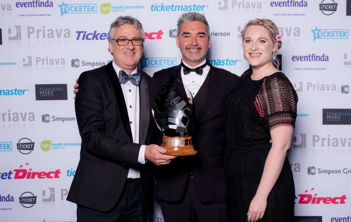 Receiving an EVANZ Award are (left to right) Neil Cox (Isaac Theatre Royal) Matt Davey (Ticket Direct Sponsor) Freya Alexander (Isaac Theatre Royal)