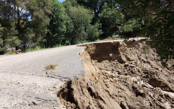 Damage on Waihau Road, where it is acting as a dam against a small lake in Dartmoor near Napier.