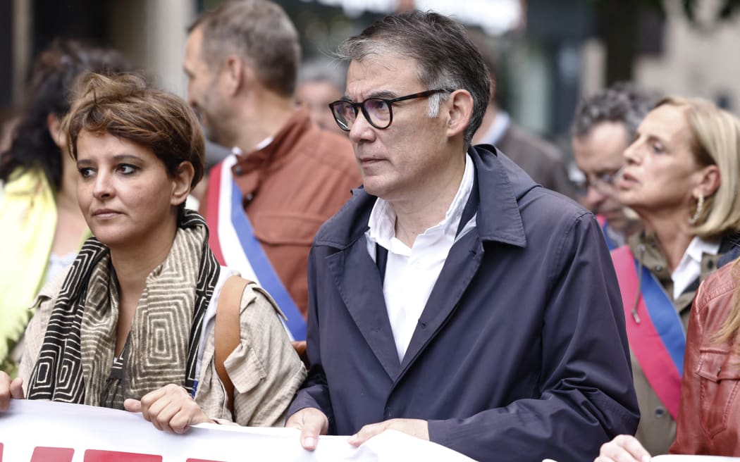 French politician Najat Vallaud-Belkacem (left) and French Socialist Party (PS) first Secretary Olivier Faure attend an anti far-right rally after French president called legislative elections following far-right parties' significant gains in European Parliament elections, in Paris on 15 June, 2024.