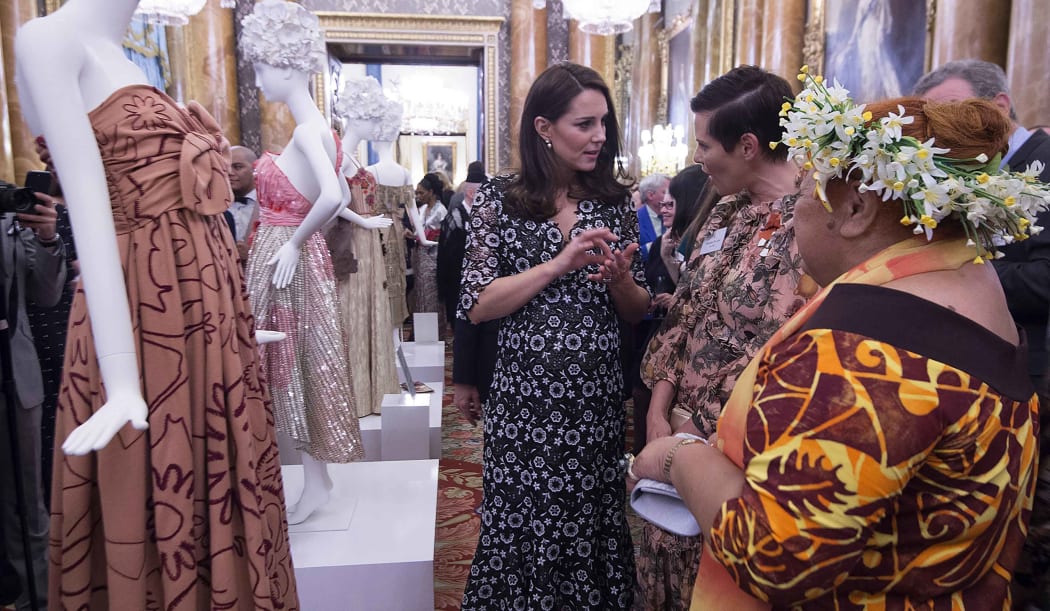 Duchess of Cambridge Kate Middleton (left), New Zealand designer Karen Walker (centre) and Tukua Turia from The Cook Islands chat during a reception to mark the creation of the Commonwealth Fashion Exchange initiative at Buckingham Palace.