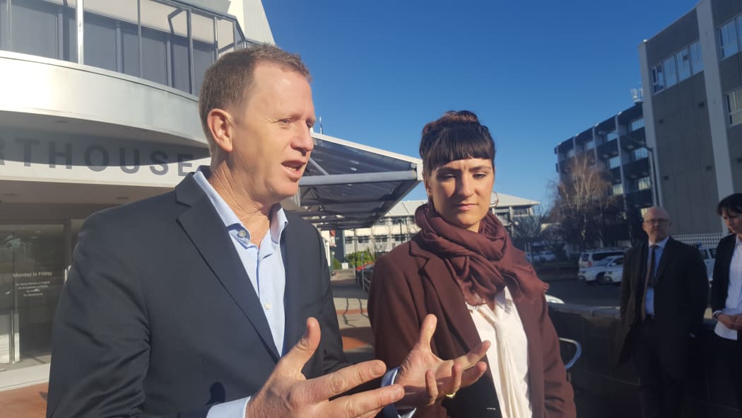 Greenpeace NZ executive director Russel Norman and volunteer Sara Howell outside Napier District Court 20 July 2018,