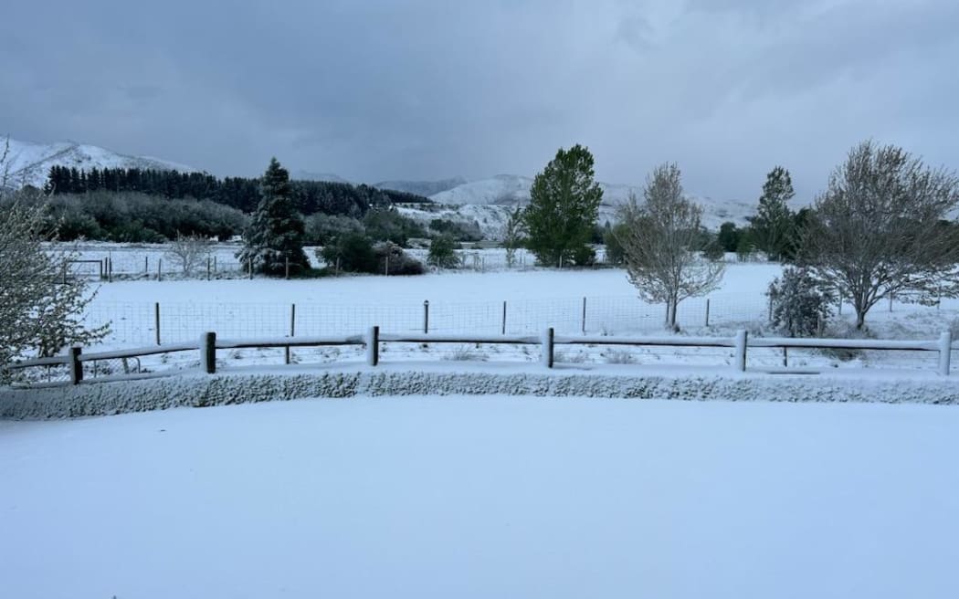 Snow to a depth of three inches is seen on dairy farmer Robert Durling's property in Athol, Southland on 27 October, 2023.