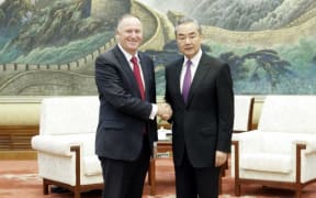 Former New Zealand prime minister Sir John Key meets China's Foreign Minister Wang Yi in Beijing on 7 November 2023 to discuss illegal plantings of Gold3 kiwifruit plantings in China.