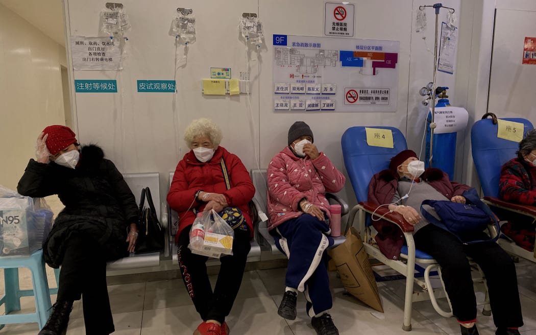 Covid-19 coronavirus patients rest in the Second Affiliated Hospital of Chongqing Medical University in China's southwestern city of Chongqing on December 23, 2022. (Photo by Noel CELIS / AFP)