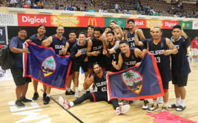 Guam celebrate winning back to back Pacific Games titles.