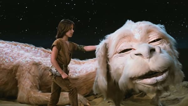 Atreyu (Noah Hathaway) with Falkor the luckdragon in the 1984 film The NeverEnding Story.