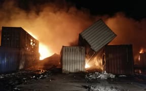 Containers on fire at Syria's Latakia port after what Syrian Arab News Agency described as an Israeli air strike early on 28 December, 2021.