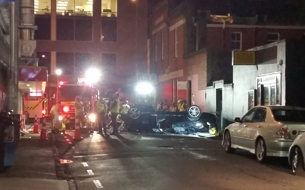 The scene at York Street after a car plunged off a building.