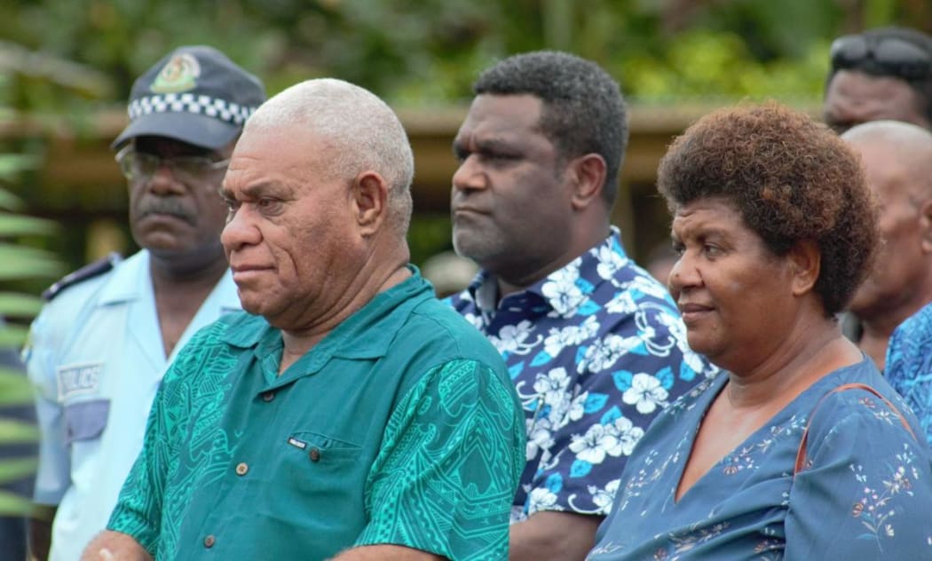 Vanuatu's PM (L) and officials on the island of Santo.