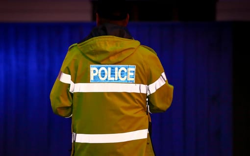 A police officer at a alcohol check point.