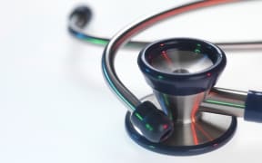 Stethoscope against a white background.