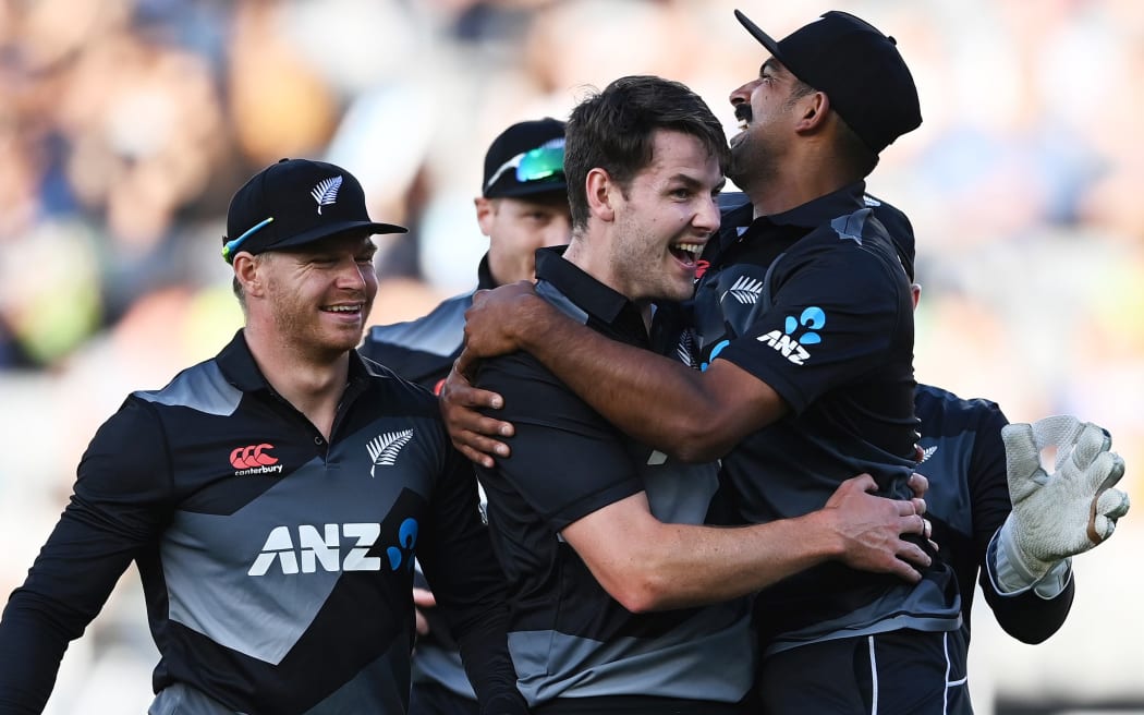 Ish Sodhi celebrates with Jacob Duffy after his wicket of Adbuuah Shafique. New Zealand Black Caps v Pakistan. International Twenty20 Cricket. Eden Park, Auckland, New Zealand. Friday 18 December 2020. © Copyright Photo: Andrew Cornaga / www.photosport.nz