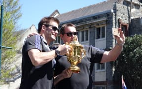 All Blacks captail Richie McCaw, left, and coach Steve Hansen during a victory parade in Christchurch.