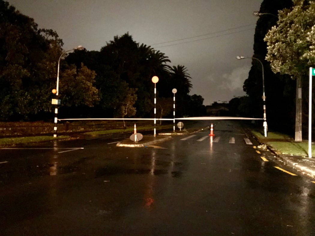 Gillies Ave in Epsom, cut off after a major storm overnight brought down trees and cut power in the area.