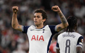 Tottenham Hotspur's Welsh forward #22 Brennan Johnson celebrates scoring the opening goal during the UEFA Europa League final football match between Tottenham Hotspur and Manchester United at San Mames stadium in Bilbao on May 21, 2025. (Photo by Josep LAGO / AFP)
